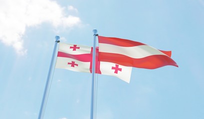 Georgia and Austria, two flags waving against blue sky. 3d image