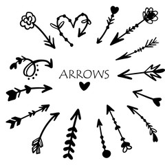 Hand drawn vector arrows set. Doodle elements.