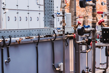 Side view of the commercial central air handling unit with cooling coil