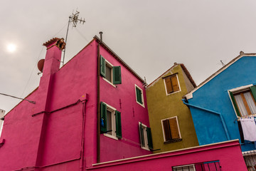Italy, Venice, Burano, view and architectural details of the typical colored houses.