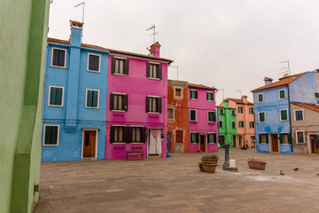 Italy, Venice, Burano, view and architectural details of the typical colored houses.