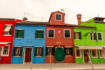 Italy, Venice, Burano, view and architectural details of the typical colored houses.