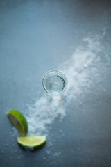 a shot of tequila with salt and lime