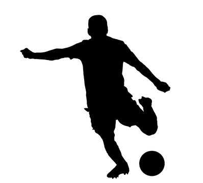 Joueur de football armant une frappe