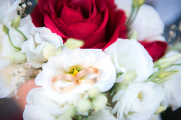 wedding rings and flowers