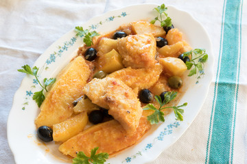 Cod with tomatoes and polenta