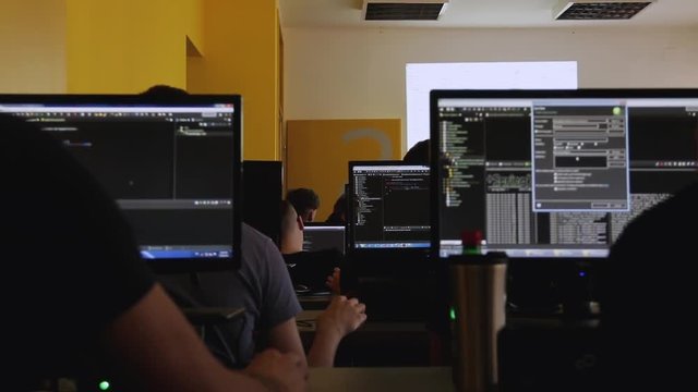 The IT Class stock video is a stunning bit of video that features students working on codes in their IT class at the university. 