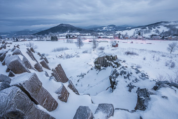 Winter basalt formation Panska skala, close Kamenicky Senov in Czech Republic.