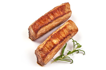Grilled homemade pork ribs, roasted bbq meat, close-up, isolated on white background