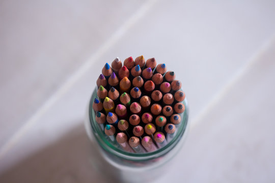Colored pencils in a mason jar