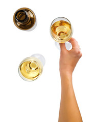 Female hand holding wine glass isolated top view