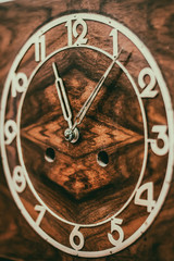 Fototapeta na wymiar Dial of old wooden clock