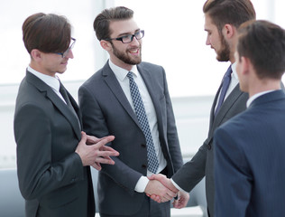 handshake business people in the office.