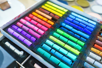 Pastel crayons paint special palette box.  Accessories and tools of the artist for drawing.