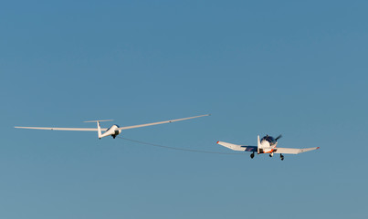 Glider pulled by motor aircraft.