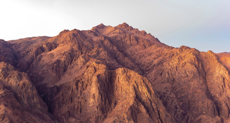 Obraz premium Egypt. Mount Sinai in the morning at sunrise. (Mount Horeb, Gabal Musa, Moses Mount). Pilgrimage place and famous touristic destination.