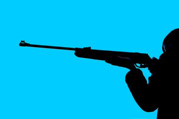 Man aiming a gun. Blue background. Shooting a man. Weapons concept. Terrorism concept. Isolate.