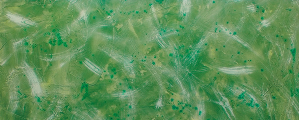 green background, texture of plaster, paint strokes and splashes, long banner