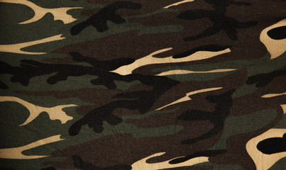 Closeup of military uniform surface. Texture of fabric, close-up, military coloring