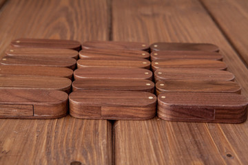 Many wooden usb flash drive on wooden background