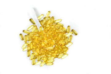 Top view of fish oil in bowl for good health on white background. Supplementary food. Vitamin E. Vitamin D.