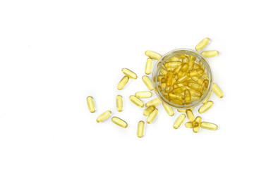 Top view close up of Fish oil capsules. Isolated with copy space for text. Supplementary food. Omega 3. Vitamin E.