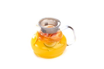 Citrus lemonade in a jug on an isolated white background