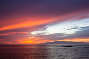 beautiful sunset over the Atlantic ocean at Costa Adaje, Tenerife Island, Spain
