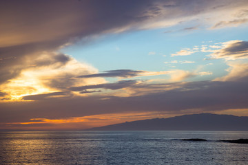 beautiful sunset over the Atlantic ocean at Costa Adaje, Tenerife Island, Spain