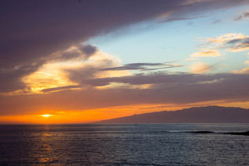 Fototapeta na wymiar beautiful sunset over the Atlantic ocean at Costa Adaje, Tenerife Island, Spain