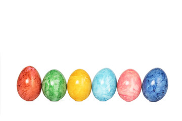Different decorative Easter eggs in a row isolated on white background