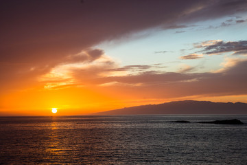 beautiful sunset over the Atlantic ocean at Costa Adaje, Tenerife Island, Spain