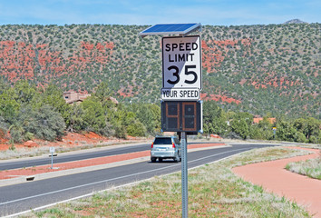 Motorists ignore speed limit signs on State Route 179 in Sedona, Arizona. - obrazy, fototapety, plakaty
