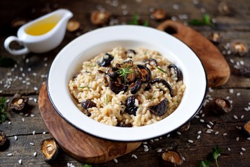 Traditional Italian risotto with dried mushrooms, parmesan cheese, vegetable broth and white wine.