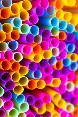Close up to plenty colorful straws background