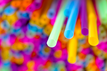 Close up to plenty colorful straws background
