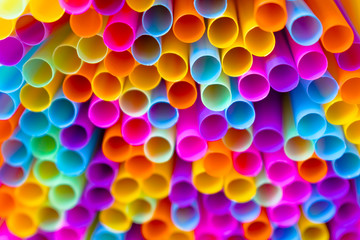 Close up to plenty colorful straws background