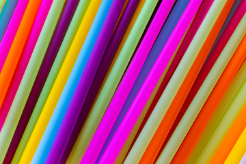 Close up to plenty colorful straws background