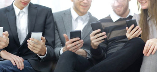 close up.the business team uses their smartphones