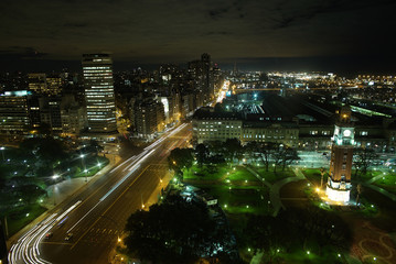Fototapeta na wymiar 121/5000 Night city, Retiro, Buenos Aires, Argentina. movement of city lights, buildings with lights on