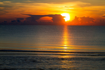 Sunrise and silhouette on baech at beach Ban Krut