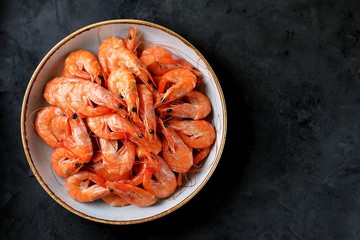 Boiled big sea prawns (shrimps). Healthy food. Top view. Copy space. 