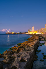 Havana at night - The castle of El Morro and the Havana seaside skyline