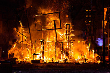 Valencia, Spain - March 19, 2019: End of the Valencian festivities of Fallas, Monument faller consumed in the fire in high flares.