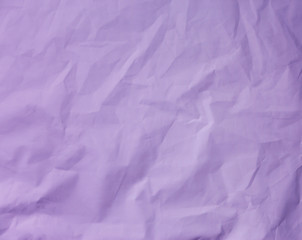Crumpled purple paper. Vintage background for design.