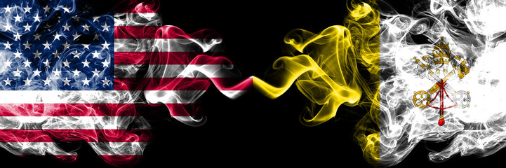 United States of America vs Vatican city smoky mystic flags placed side by side. Thick colored silky smoke flags of America and Vatican city