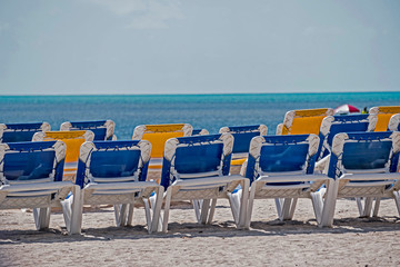 Colorful beach chairs and buildings of Key West.