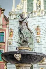 Historic Neptune's Fountain on Long Market in old town Gdansk, Poland © Darios