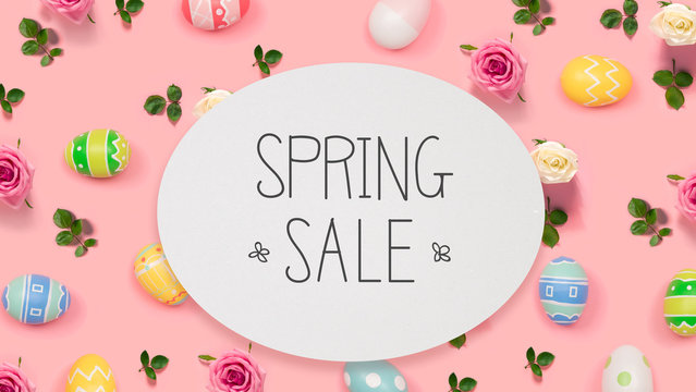 Spring sale message with Easter eggs on a pink background