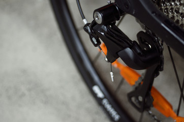 Fototapeta premium Closeup of front bicycle wheel, hub and spokes of road bike
